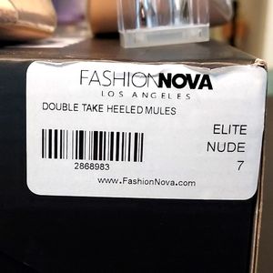 A pair of double take healed mules size 7